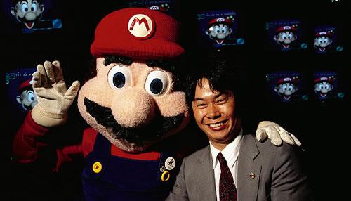 Shigeru Miyamoto with a very fat faced Super Mario