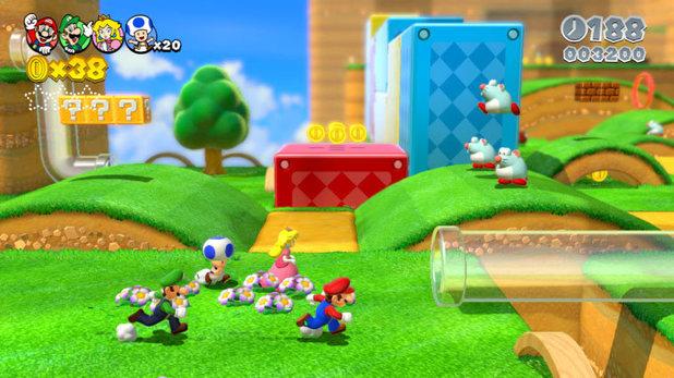Mario, Luigi, Peach and Blue Toad heading towards a transparent pipe in Super Mario 3D World