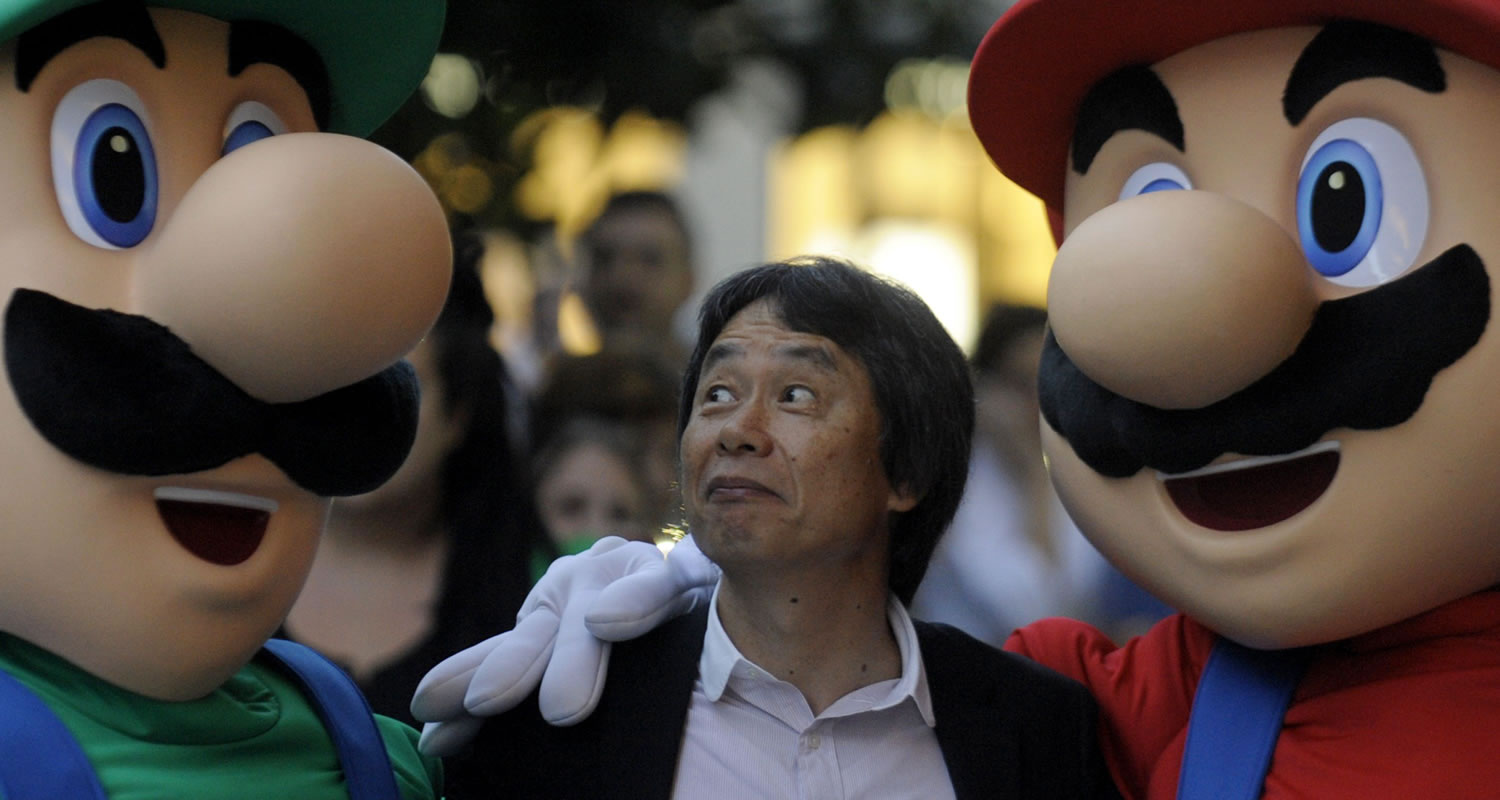 Shigeru Miyamoto with Mario and Luigi